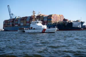 Containership Dali with USCG escort vessel