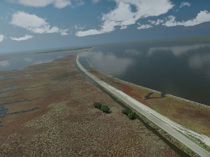 Aerial view of the Dauphin Island Restoration project, showcasing the newly constructed rock breakwaters along the Dauphin Island Causeway. These structures are vital in protecting the island's shoreline and preserving its natural habitat. The dredge material used for this project is sourced from the Mobile Harbor Deepening and Widening project. (Photo courtesy of Mobile County and Moffatt Nichol)