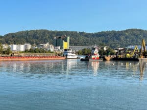 Boat passes through navigation channel