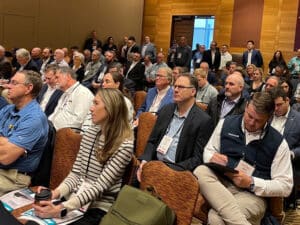 Audience members watch the opening panel discussion at Marine Log's FERRIES 2024 conference in Seattle on October 29.