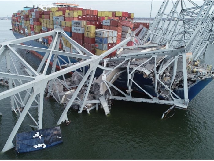 The containership Dali with portions of the collapsed Francis Scott Key Bridge across its forward deck on March 28, 2024. (Source: NTSB)